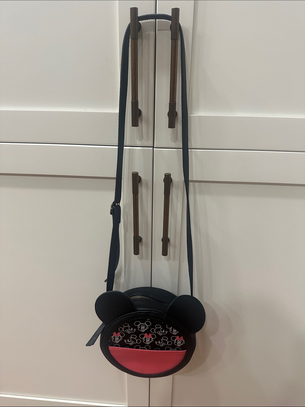 Dani by Danielle Nicole Mickey Ear Crossbody Bag in Black and Pink